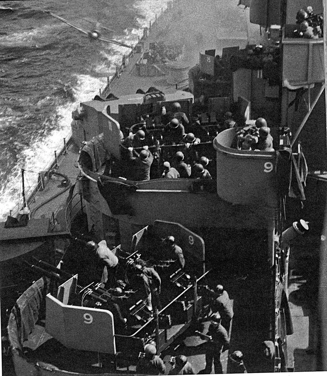A kamikaze pilot (top left) moments before striking the Missouri's side on April 11, 1945